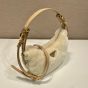 Prada Arqué shearling and leather shoulder bag