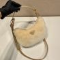 Prada Arqué shearling and leather shoulder bag