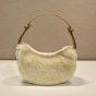 Prada Arqué shearling and leather shoulder bag