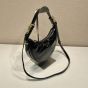 Prada Arqué naplak patent leather shoulder bag
