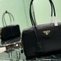 Prada Re-Nylon and leather medium top-handle bag with padlock