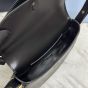 Prada Arqué leather shoulder bag with flap