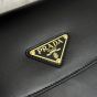Prada Arqué leather shoulder bag with flap