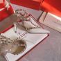 Valentino PATENT ROCKSTUD CAGED PUMP 