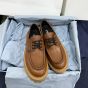 Prada Laced leather loafers