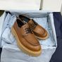 Prada Laced leather loafers