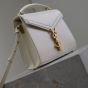 YSL CASSANDRA Mini top handle bag in grain de poudre embossed leather