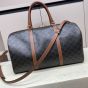Celine MEDIUM TRAVEL BAG IN TRIOMPHE CANVAS AND CALFSKIN