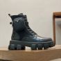 Prada Monolith leather and Re-Nylon boots with pouch