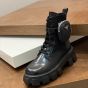 Prada Monolith leather and Re-Nylon boots with pouch