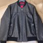 Gucci GG embossed leather bomber jacket