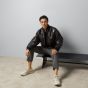 Gucci GG embossed leather bomber jacket