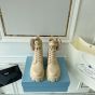 Prada Monolith leather and Re-Nylon boots with pouch
