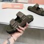 MIU MIU Raffia-effect woven fabric slides