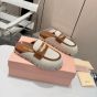 MIU MIU Canvas and leather mules