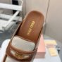 MIU MIU Canvas and leather mules