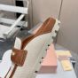 MIU MIU Canvas and leather mules