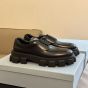Prada Monolith brushed leather lace-up shoes