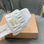 MIU MIU Matelassé nappa leather slides