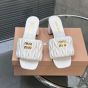 MIU MIU Matelassé nappa leather slides