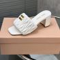 MIU MIU Matelassé nappa leather slides