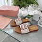 MIU MIU Canvas and leather slides