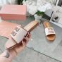 MIU MIU Canvas and leather slides
