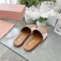 MIU MIU Canvas and leather slides