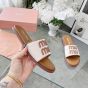 MIU MIU Canvas and leather slides