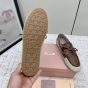 MIU MIU Canvas and bleached leather boat shoes
