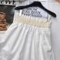 Hermès High-waisted smocked skirt