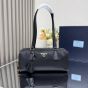 Prada Re-Nylon and leather medium top-handle bag with padlock