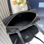 Prada Re-Nylon and leather medium top-handle bag with padlock