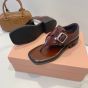 MIU MIU Leather thong sandals with buckle