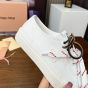 MIU MIU Washed denim sneakers