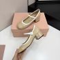 MIU MIU Two-tone patent leather Mary Jane pumps