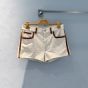 MIU MIU Denim and leather shorts