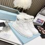 Prada Leather and shearling high-top sneakers