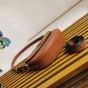 Prada Arqué leather shoulder bag with flap