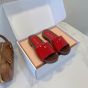 MIU MIU Patent leather clogs