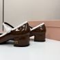 MIU MIU Two-tone patent leather Mary Jane pumps