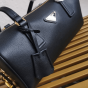 Prada Medium leather top-handle bag with padlock