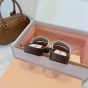 MIU MIU Patent leather clogs