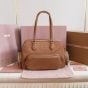 MIU MIU Pocket nappa leather top-handle bag