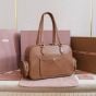 MIU MIU Pocket nappa leather top-handle bag