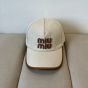Miu Miu Canvas and leather baseball cap