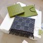 Gucci GG jacquard knit scarf with tassels