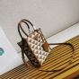 Prada Symbole embroidered fabric mini bag