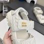 MIU MIU Matelassé nappa leather slides
