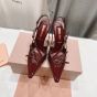 MIU MIU Patent leather slingbacks with buckles